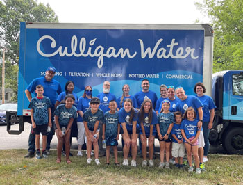 24 employee volunteers of Culligan of Kansas City scoured Frisco Lake Park in Olathe, KS for their trash cleanup mission