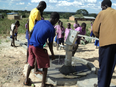 Teachers and Students get safe water at Angoltok Primary School's new well